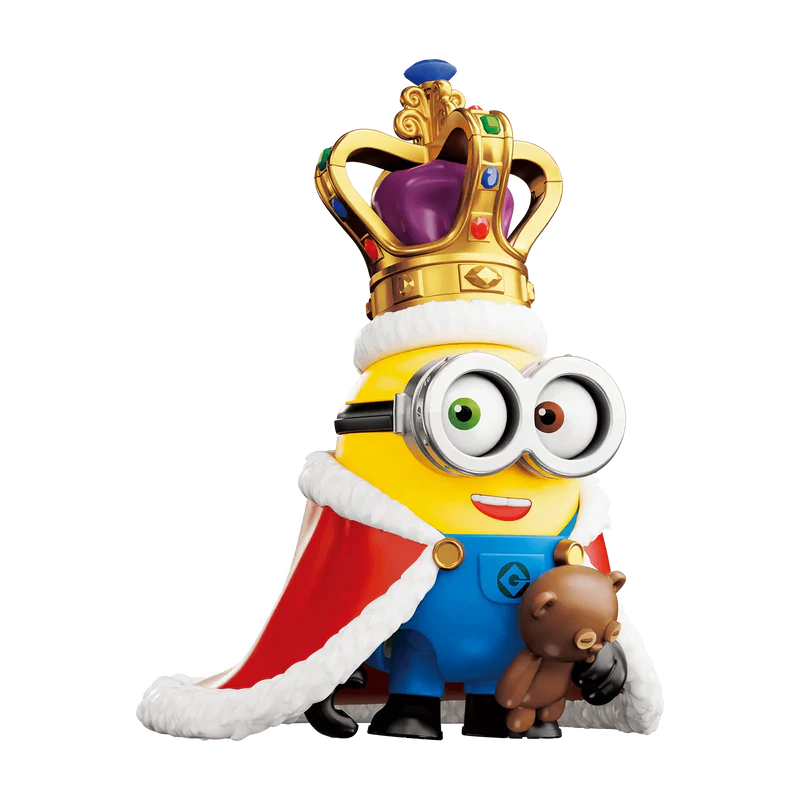 Bob Minion Figure dressed as a king holding a teddy bear.