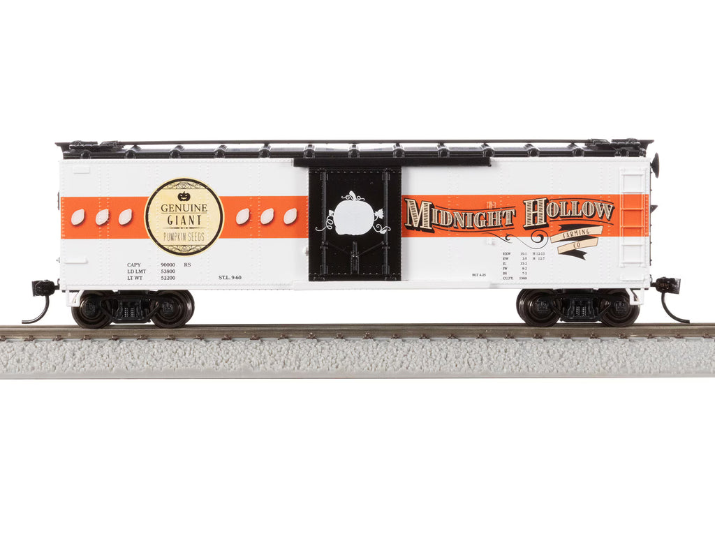 HO Scale freight car with orange stripe across and reads "Midnight Hollow" 