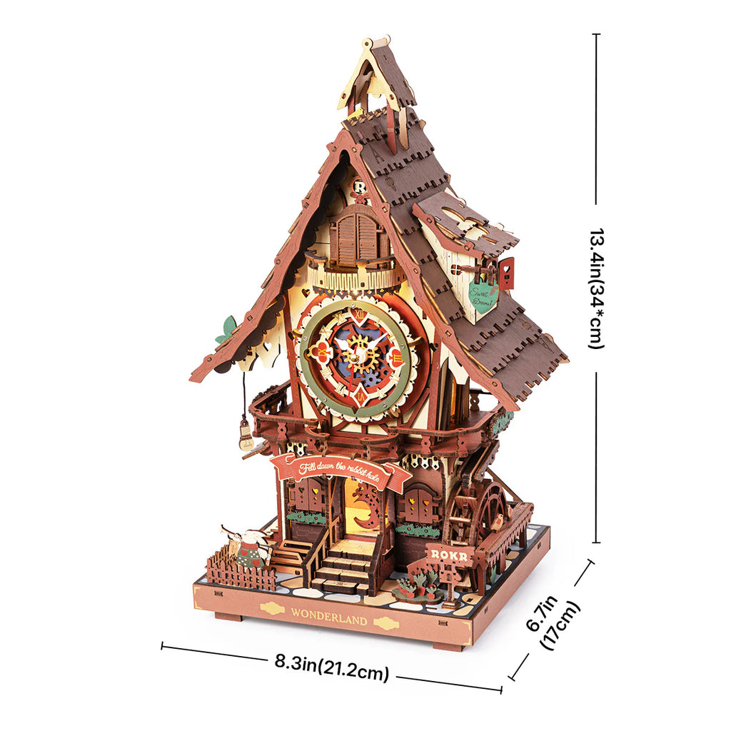 Wooden cuckoo clock model with measurements on a white background