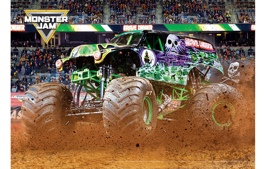 Monster truck "Grave Digger" with 'Monster Jam' branding on a dirt track in front of an audience.