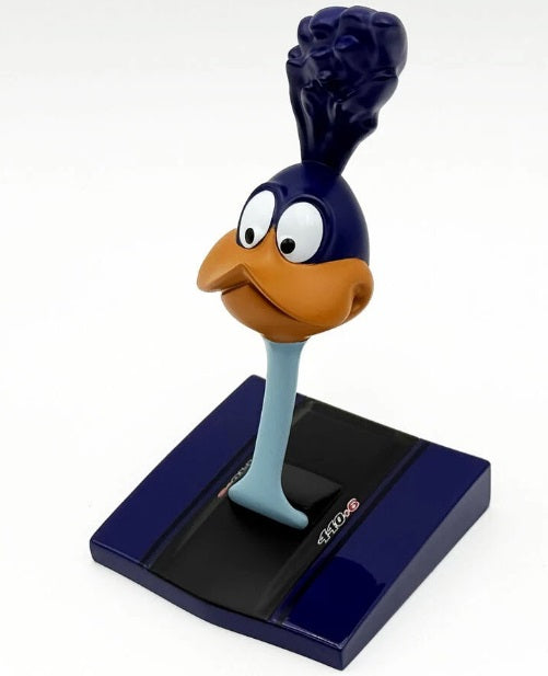 Road runner head sticking out of a car hood.