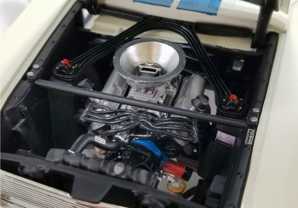 Close up of engine in diecast model car.