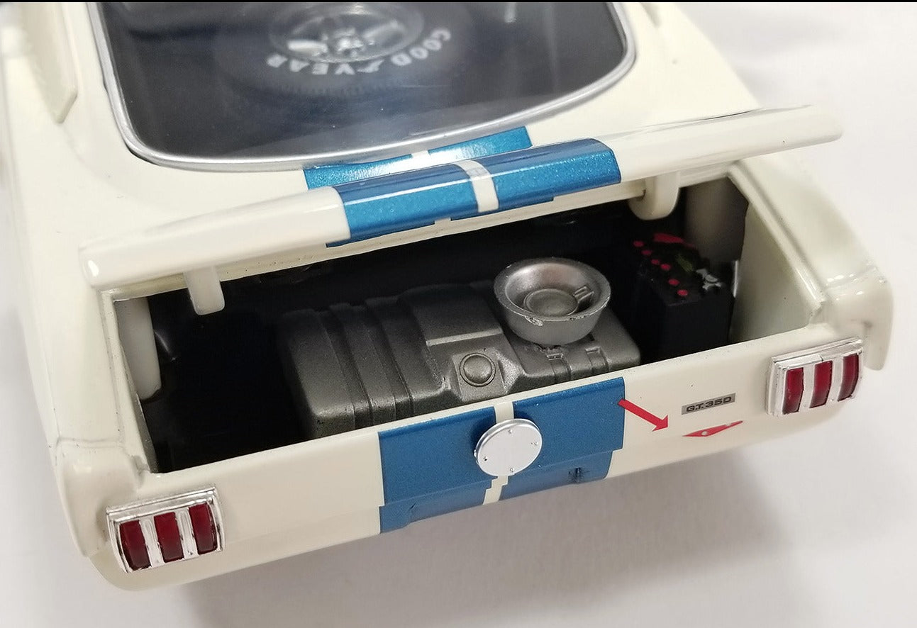 Close up of open trunk on a diecast model car.