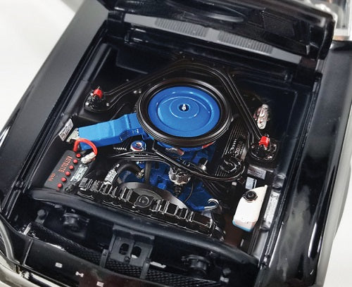 Car engine in a model of a black 1968 Shelby
