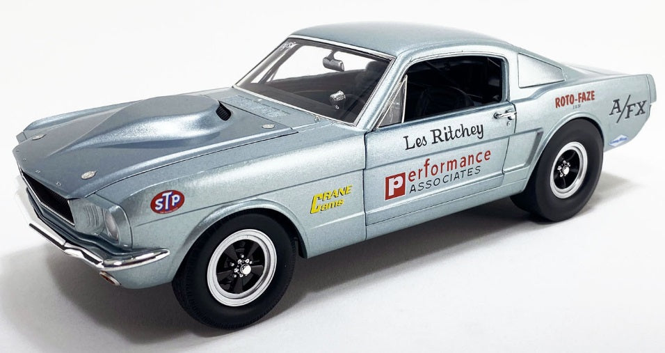 Front and side view of car with words on the side.