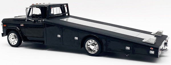 A 1/18 scale diecast model of a 1970 Dodge D-300 Ramp Truck in black color.