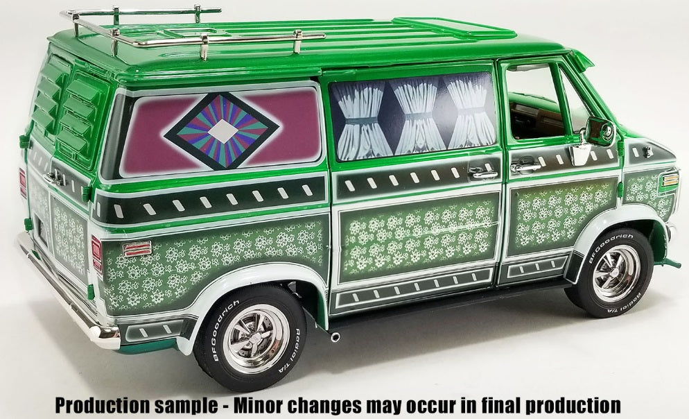 Rear and side view of green van with various patterns on the side.