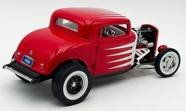 Model of red and White 3 window coupe.