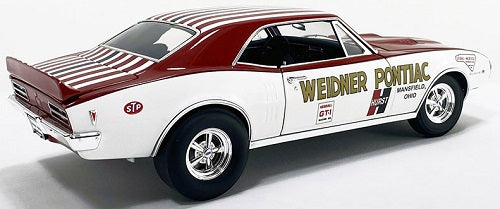 A 1/18 scale model of a 1968 Pontiac Firebird First Ram Air II with white and red color scheme.