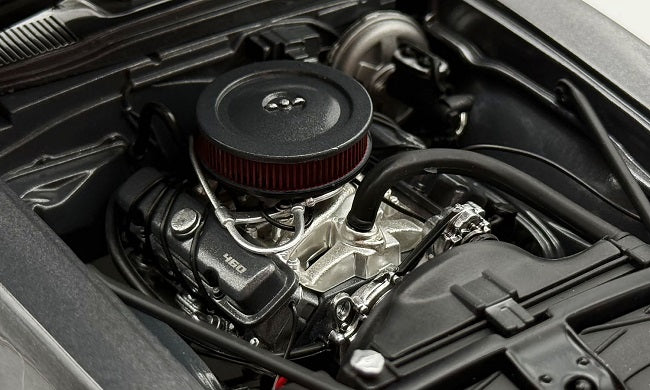 Close up of engine in diecast model car.