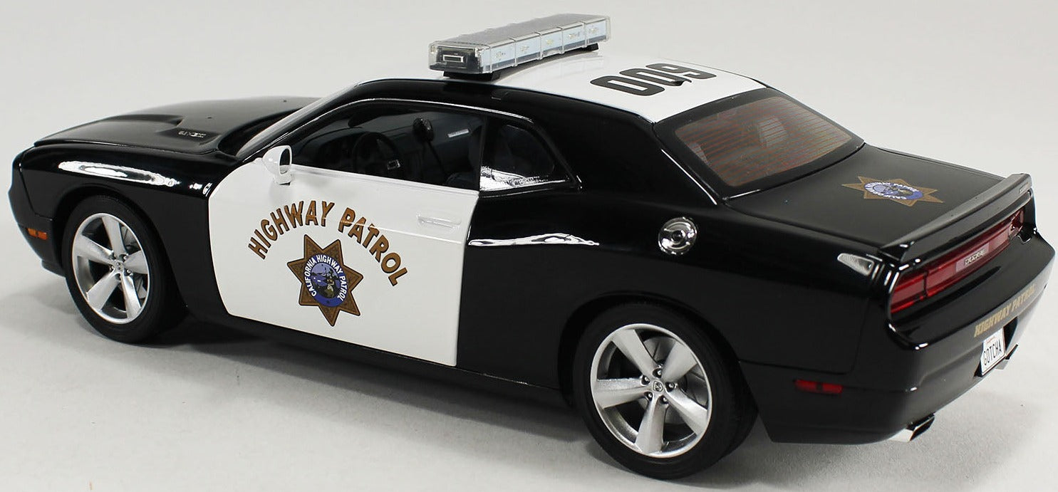 1/18 scale model of a 2009 Dodge Challenger SRT8 police car in black and white with a magnetic lightbar.