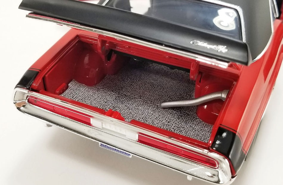 Inside trunk of 1/18 scale diecast model car.