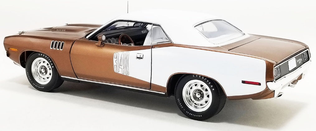 Back and side view of bronze car with white roof and white billboard on back half of car.