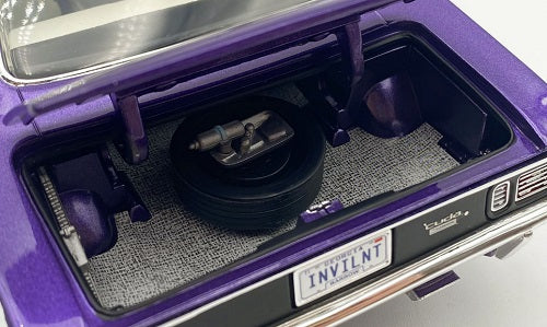 Close up of open trunk on a model car.