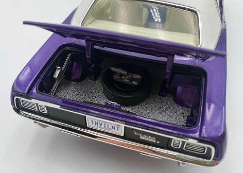 Close up of model car's open trunk.