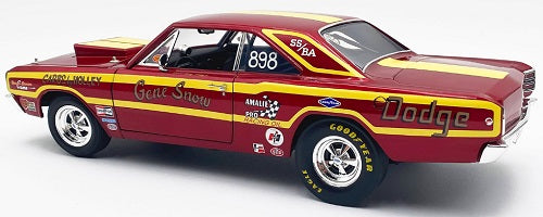 A 1/18 scale Dodge Dart Super Stock model car in red with yellow stripes and racing decals.