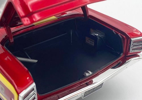 Open trunk of a 1/18 scale model car.