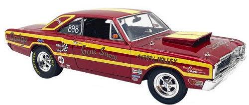 A 1/18 scale Dodge Dart Super Stock model car in red with yellow stripes and racing decals.