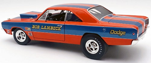 A 1/18 scale model car of a Dodge Dart in orange with blue stripes with "Bob Lambeck" printed on the side.