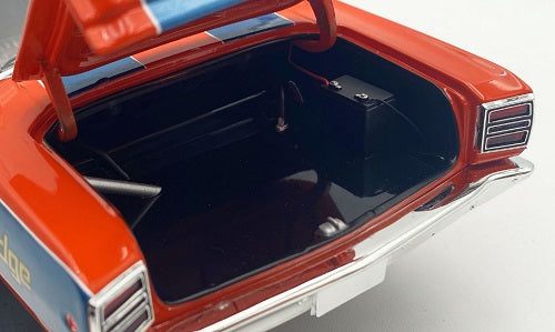 Model car with open trunk.