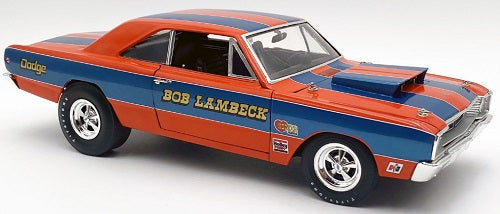 A 1/18 scale model car of a Dodge Dart in orange with blue stripes with "Bob Lambeck" printed on the side.