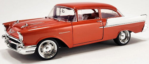 Diecast model of 1957 Chevy 150 in red and white.