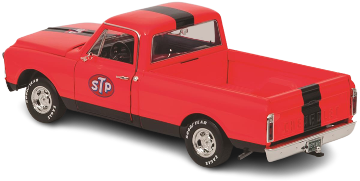 1/18 scale model of a red 1968 Chevy C-10 pickup truck with a black stripes and "STP" branding.