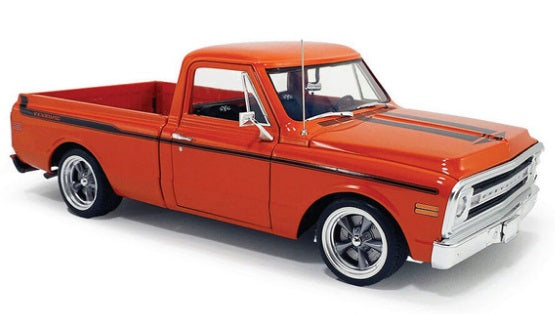 Front and side view of orang epick up truck with black stripe on the side.