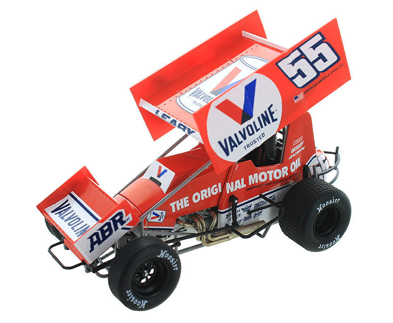 A 1/18 scale model of a red and white #55 Valvoline Alex Bowman racing sprint car with a black steering wheel and tires, featuring detailed interior and undercarriage.
