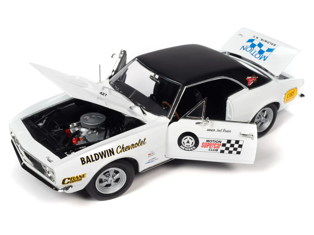 A 1/18 scale diecast model of a 1967 Camaro SS showing open open hood, doors, and trunk.