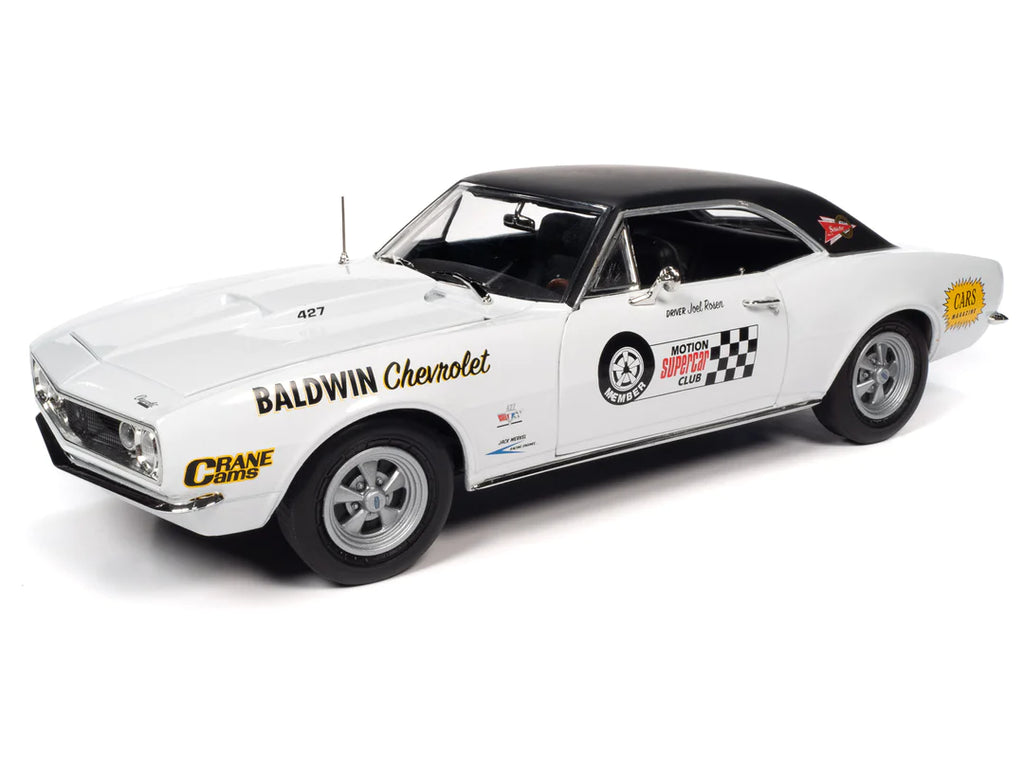 1/18 scale diecast model car of 1967 Camaro SS in white with black roof and decals on the side.