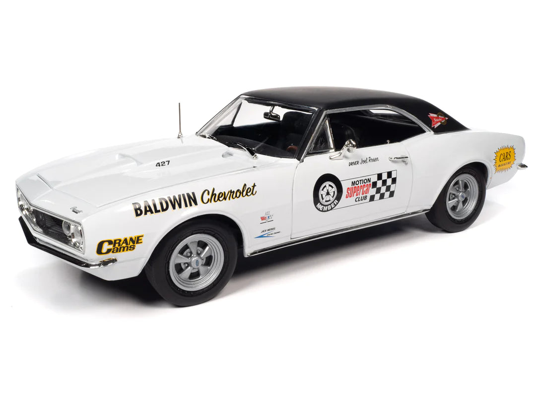 1/18 scale diecast model car of 1967 Camaro SS in white with black roof and decals on the side.