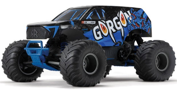 Front and side view of blue and black monster truck.