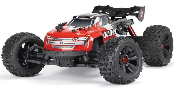 Front and side view of red speed truck.