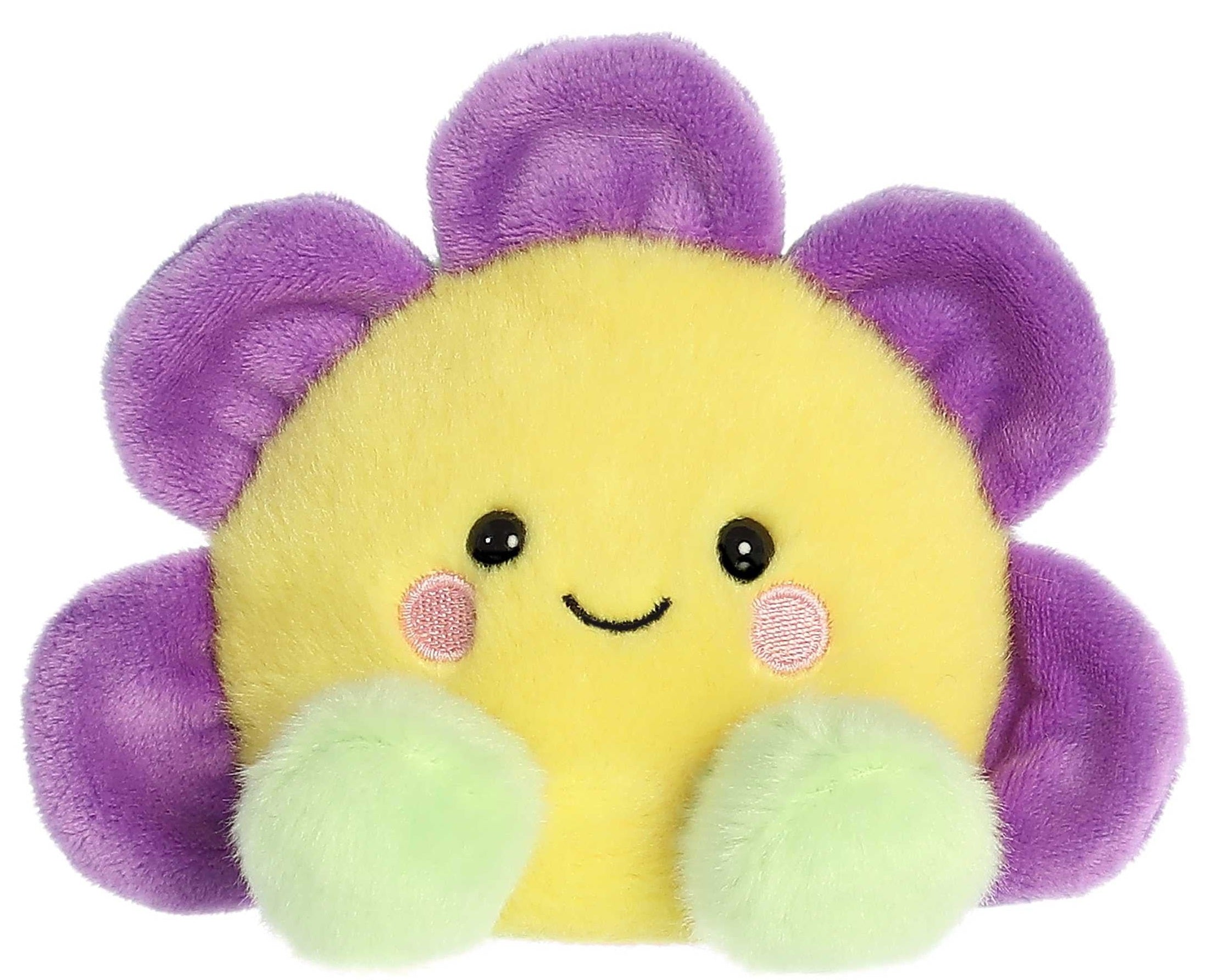A plush toy resembling a yellow flower with purple petals, two green feet, and a smiling face.