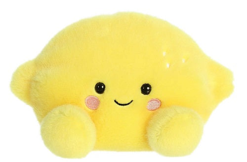 Plush lemon with smiling face and feet.