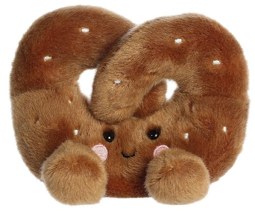 Plush pretzel with smiling face and feet.
