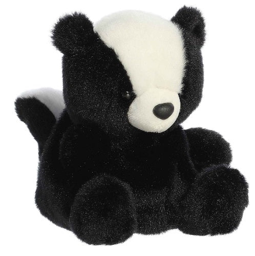 Skunk plush with white stripe in middle of face and tail.