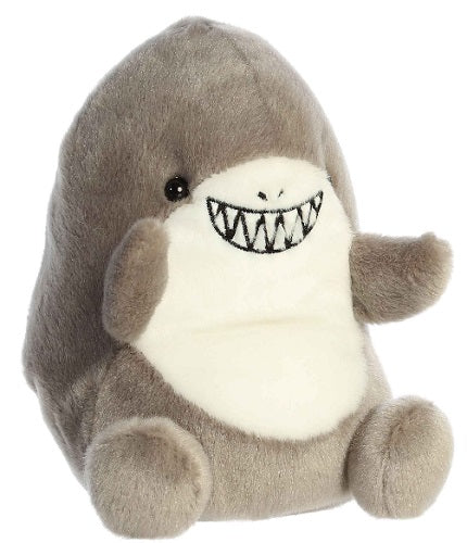 Plush shark in sitting position with feet.