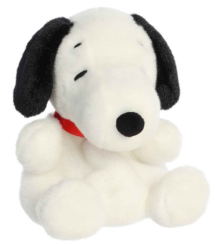 White dog with black ears plush.