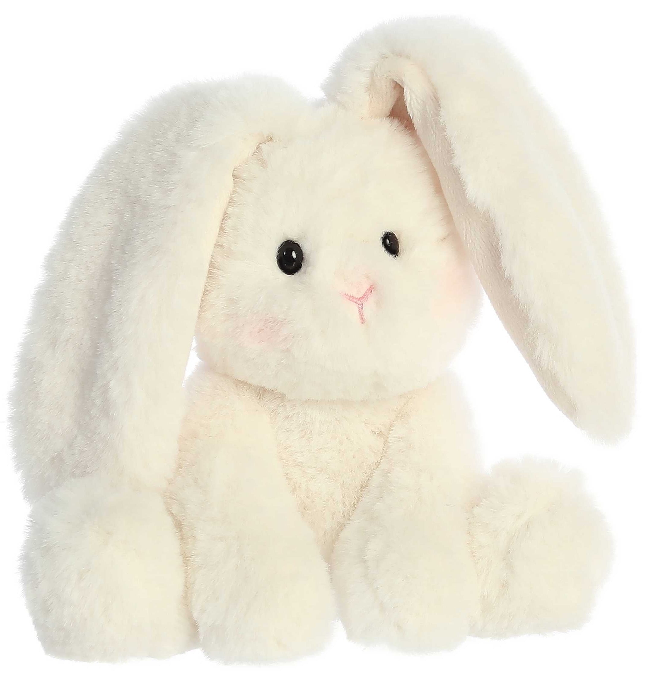 A light colored plush toy bunny with floppy long ears sitting upright.