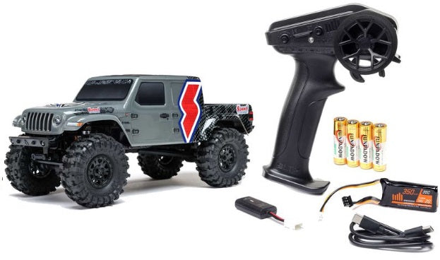 Remote control truck with controller and accessories on a white background