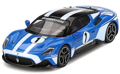A 1/64 scale diecast model of a blue Maserati MC20 with white stripes and black top, number 1 on the side.