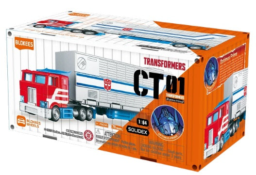 White and orange package with Optimus Prime truck pictured.