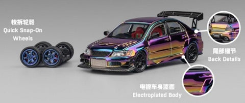 Scale model of a Mitsubishi Lancer with purple chrome paint and a second set of wheels.