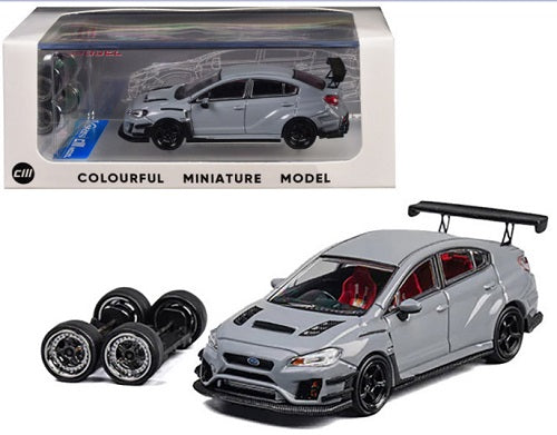 Model car of a Subaru VAB WRX in gray with same model car in a display case.