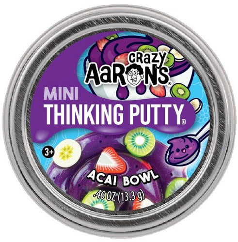 Metal tin of purple putty with small fruit shapes mixed in.