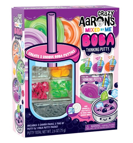 Box with drinks with large straws and chunks of different cut up fruits.