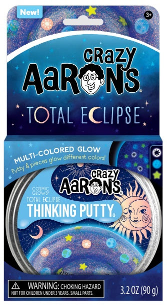 Package of sparkly putty with star, sun, and Earth shapes.
