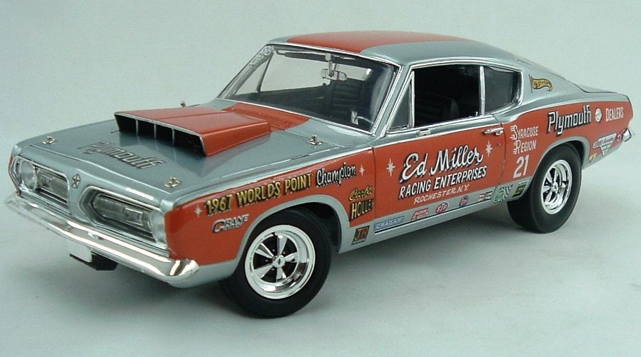 Model car with racing decals on a gray background